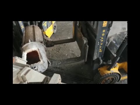 Forklift handling heavy material in a manufacturing plant