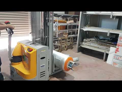 Forklift weighing agricultural crates during intake